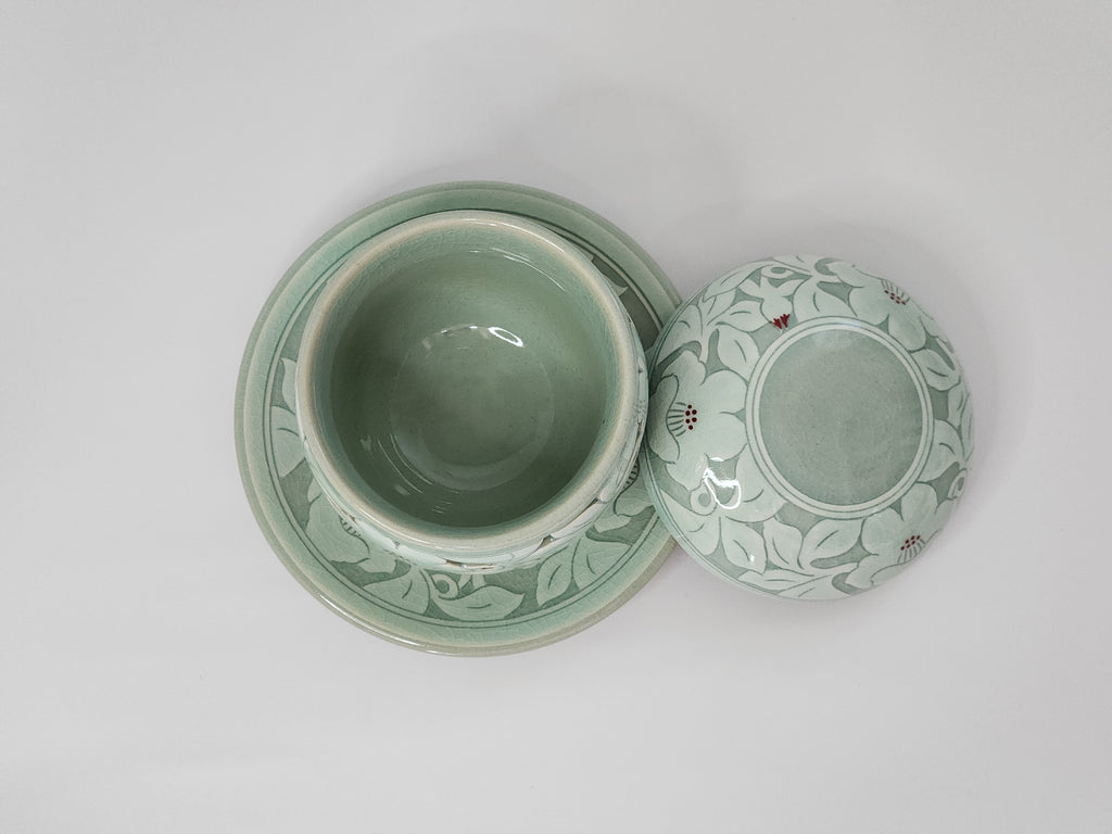 Premium celadon double openwork tea cup