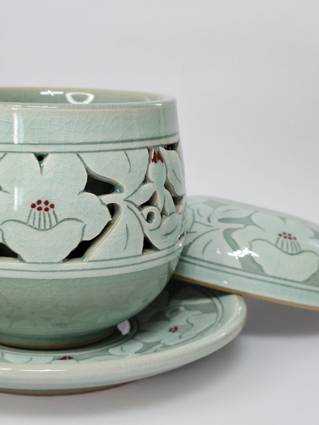 Premium celadon double openwork tea cup